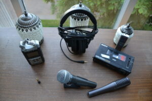 Audio recording devices - microphones, headphones and 3 recording devices. Photography by Rhonda Jesckey