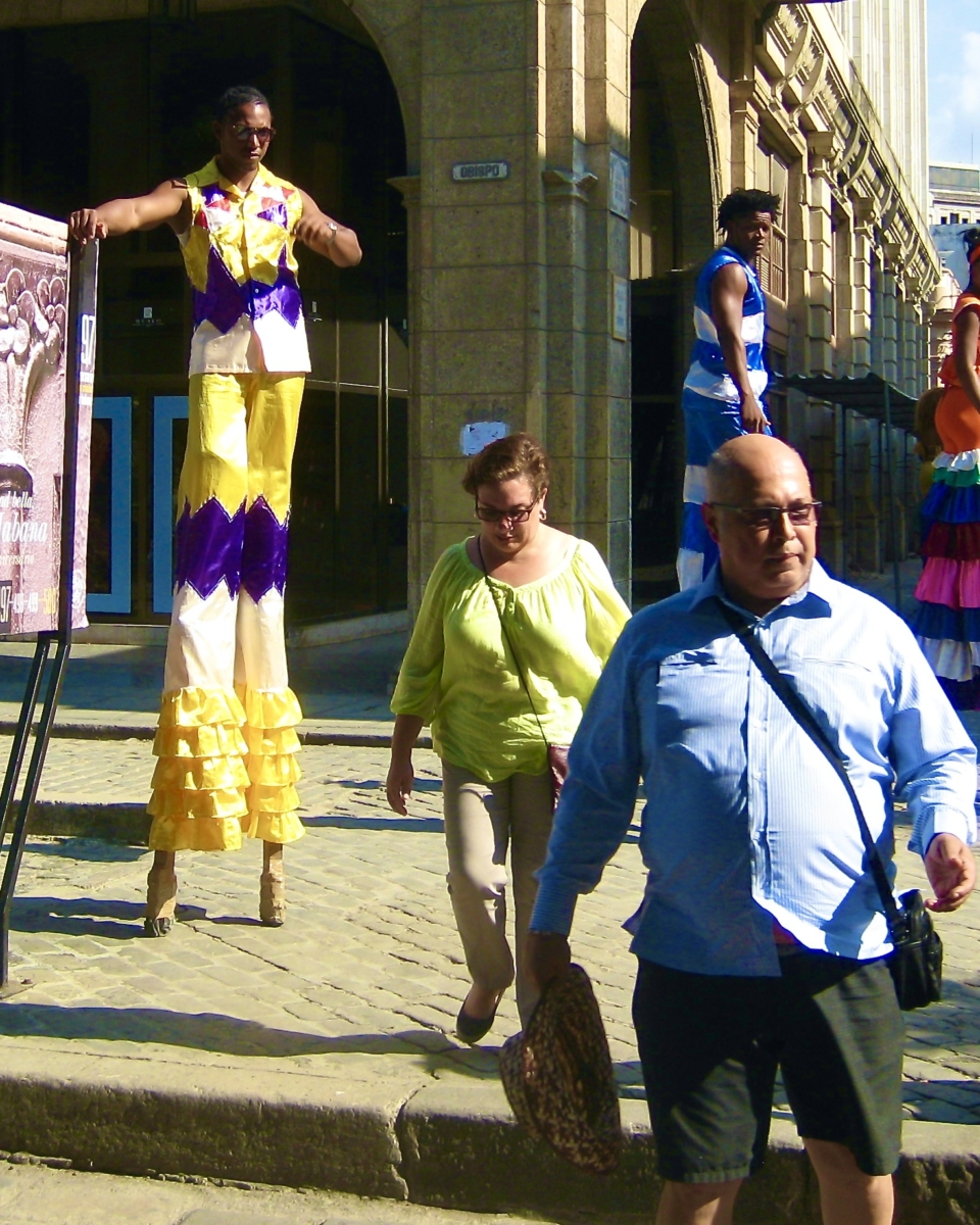 Stilt walkers on a street in Havana, Cuba as photographed by Rhonda Jesckey