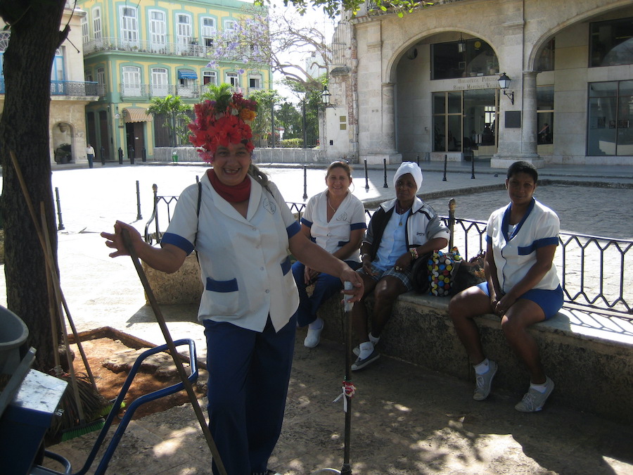 Women street cleaners taking a break in Havana, Cuba 2012. Photography by Rhonda Jesckey